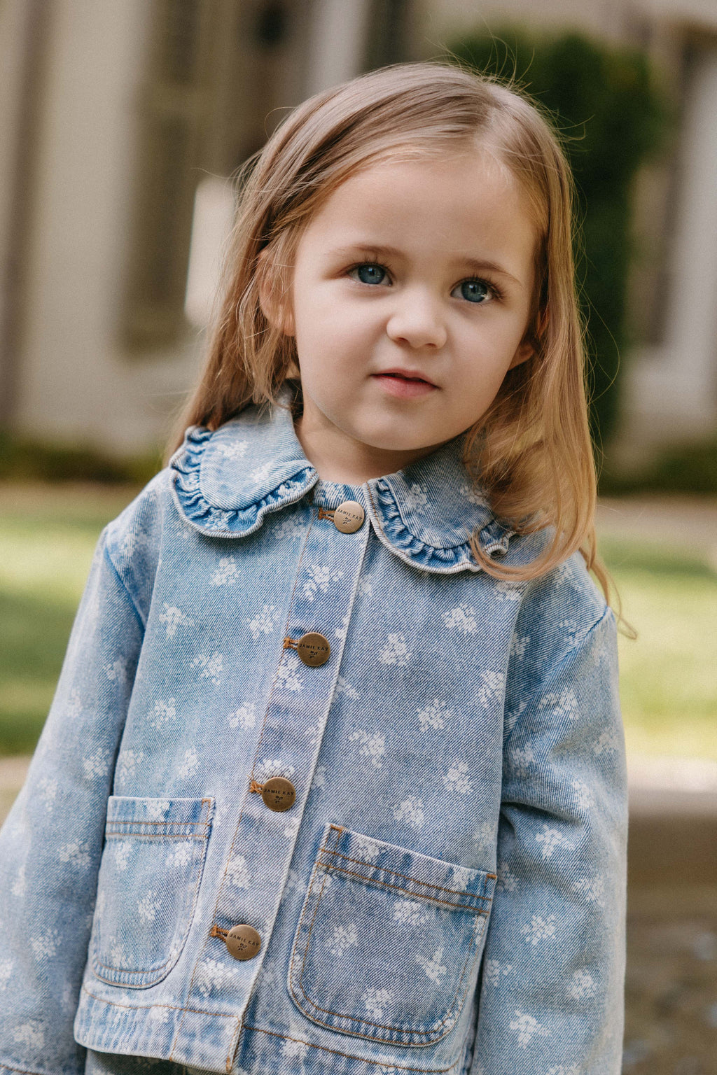 Veste en jean bleu vintage à motif floral, col rond et poches plaquées