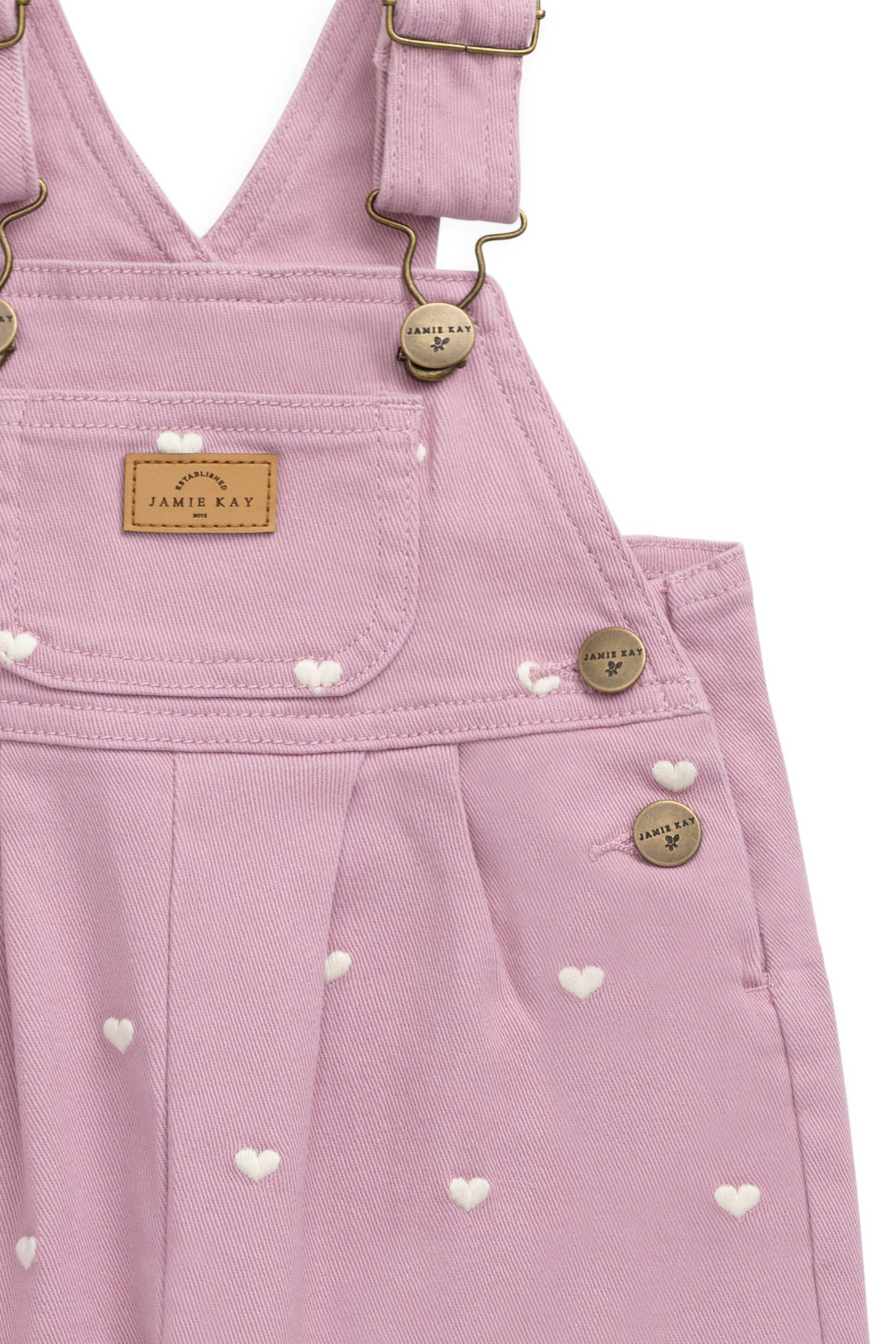 Salopette en coton et élasthanne rose vif avec bretelles réglables et poche kangouruli