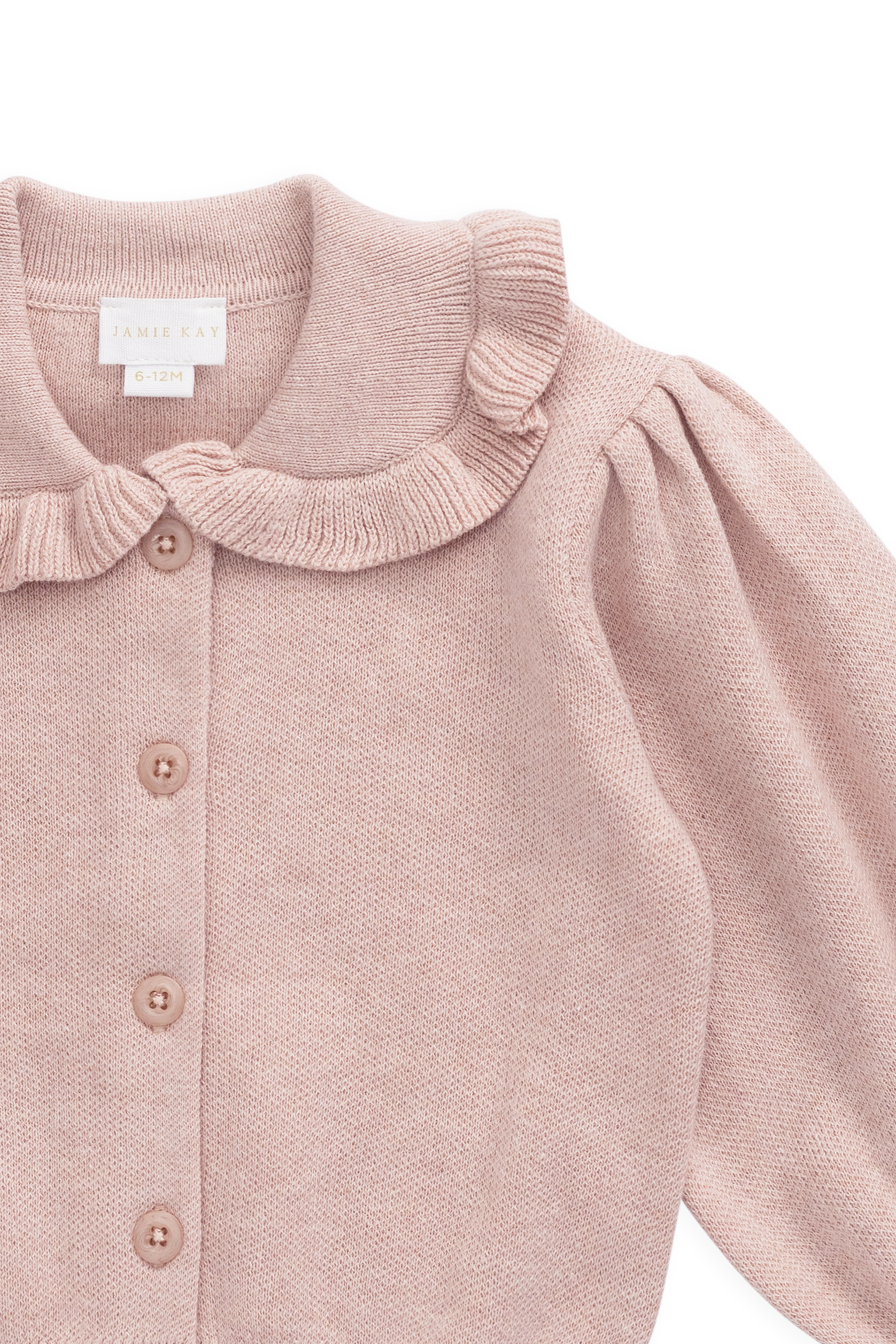 Gilet en maille de coton rose pêche avec col à volants et manches bouffantes