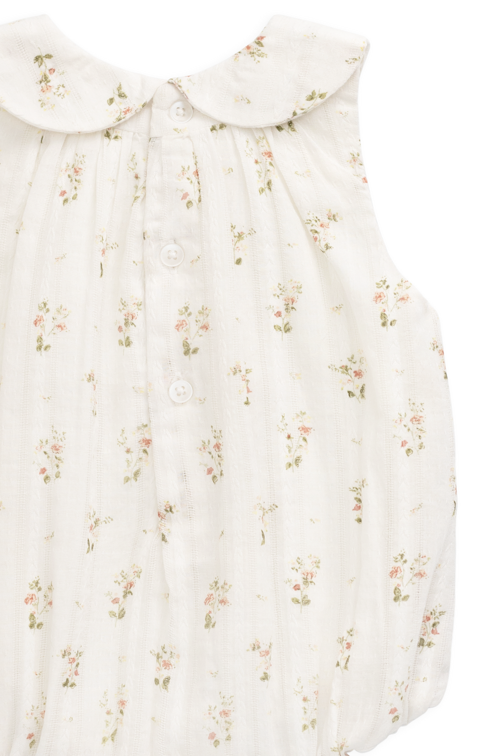 Barboteuse vintage en coton bio blanc à imprimé floral, col Claudine et jambes élastiquées